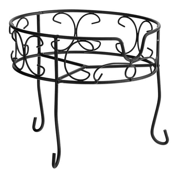 A black metal stand with swirls for an Acopa beverage dispenser.
