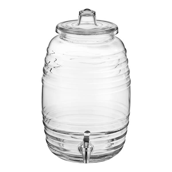 An Acopa clear glass barrel beverage dispenser with a lid and tap.