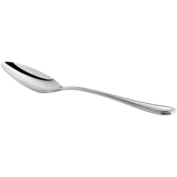 An Acopa Edgeworth stainless steel tablespoon with a silver handle.
