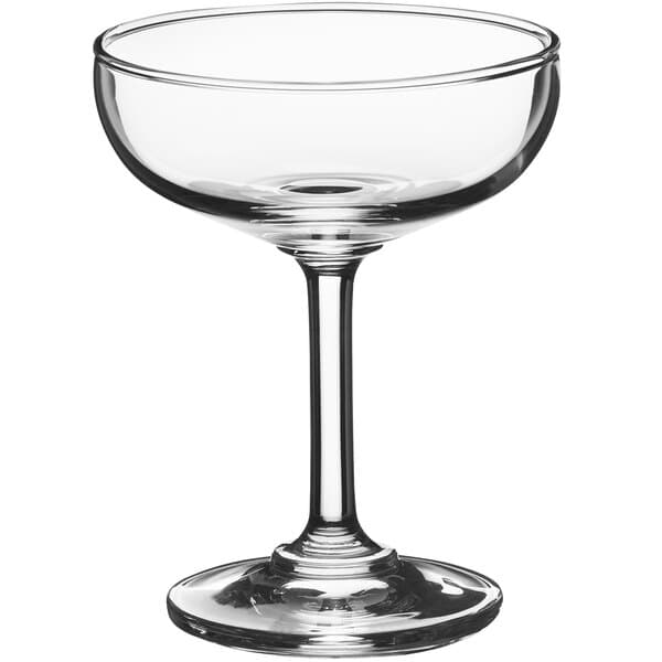 An Acopa clear glass coupe with a stem.