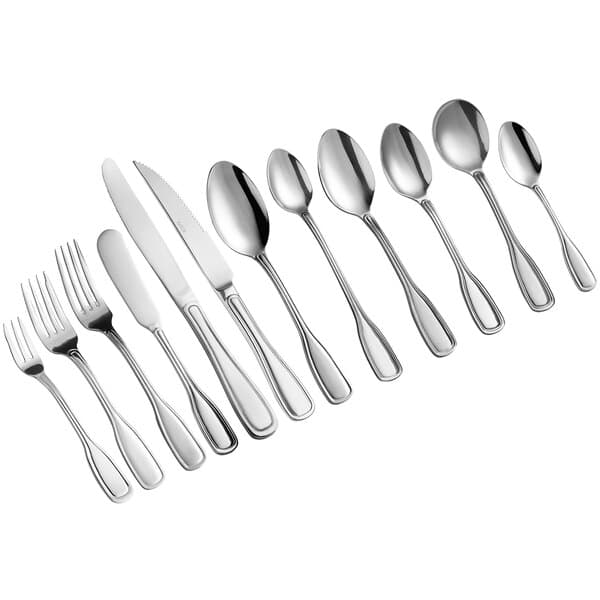 A close-up of an Acopa Saxton stainless steel salad/dessert fork.