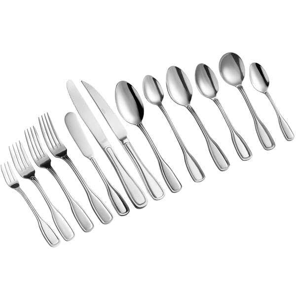 A close-up of an Acopa Scottdale stainless steel bouillon spoon.