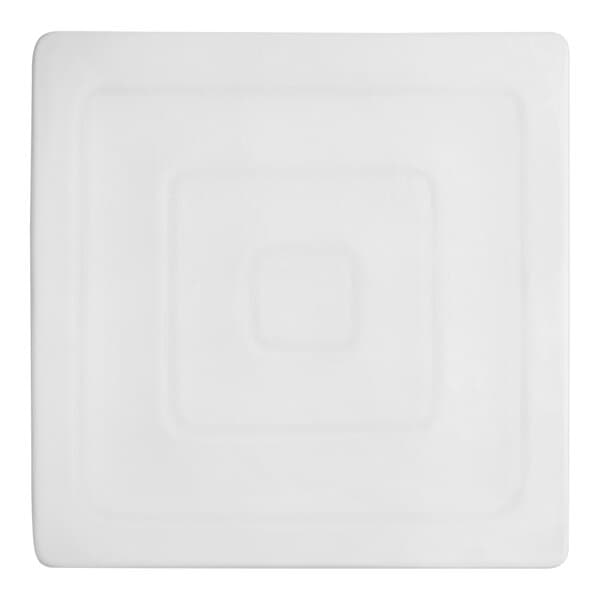 A white square Acopa porcelain plate with a square design.