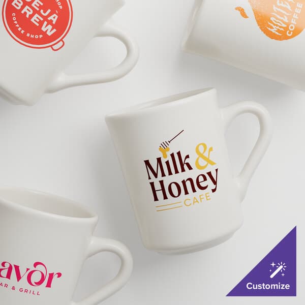 A close up of a white Acopa stoneware mug with a red logo.