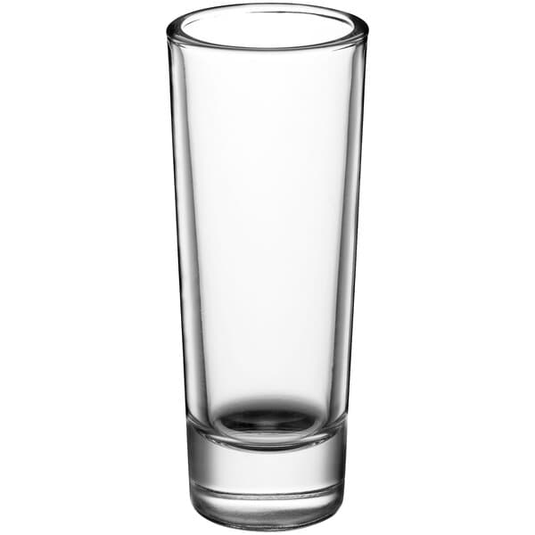 A clear Acopa shot glass with a black rim.