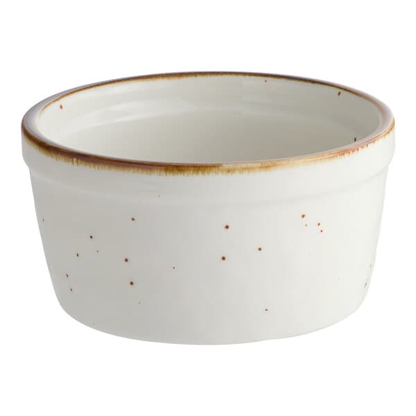 An Acopa Keystone stoneware ramekin with brown specks on a white background.