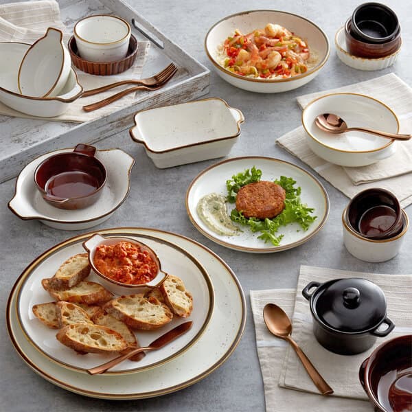 An Acopa stoneware mini rarebit dish with chocolate sauce in it.