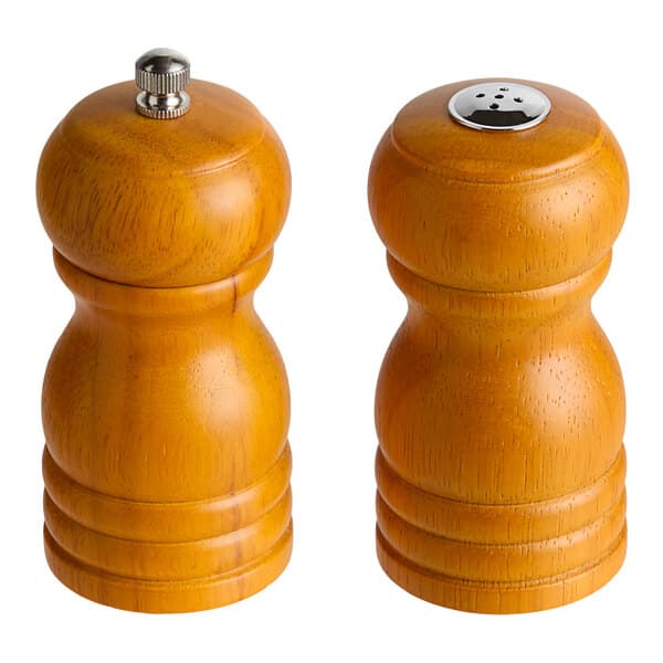 Two wooden Acopa salt and pepper shakers with brown accents.