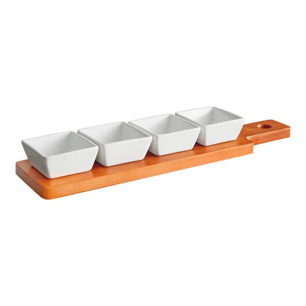 An Acopa wooden paddle with square white tasting bowls on it.