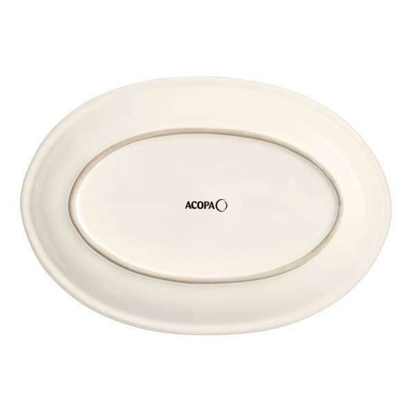 a white oval plate with black text