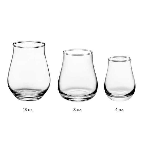 An Acopa Select whiskey glass with a white background.