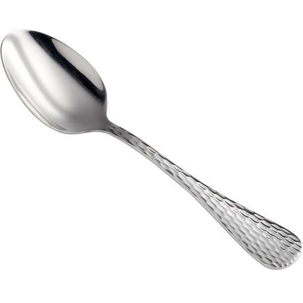 a silver spoon on a white background