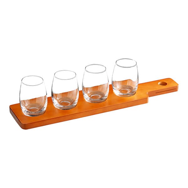 two glasses on a shelf
