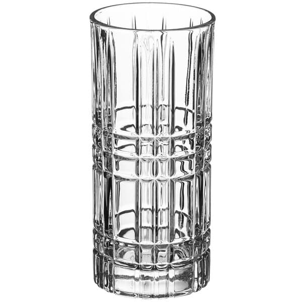 A close-up of an Acopa highball glass with a checkered pattern.