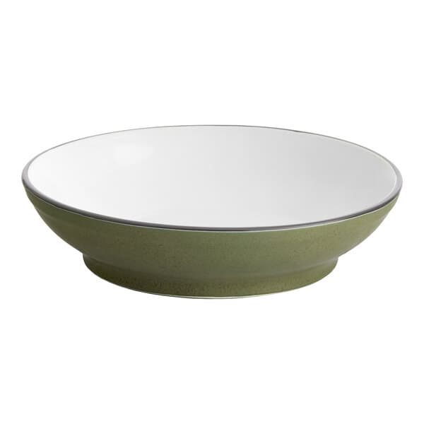 A moss green stoneware bowl with a white rim.
