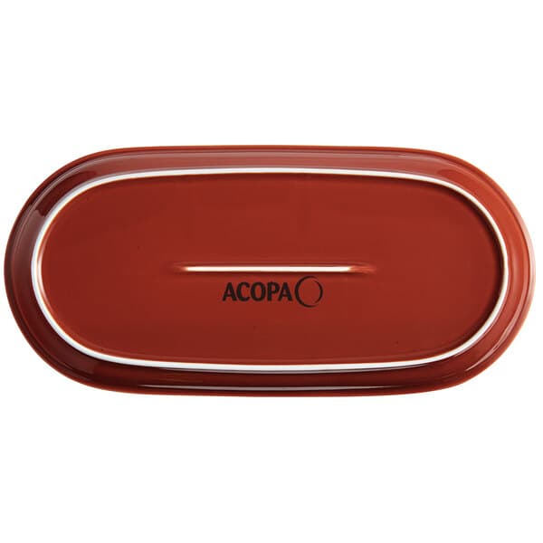 An Acopa Sedona Orange stoneware oblong coupe platter on a table.