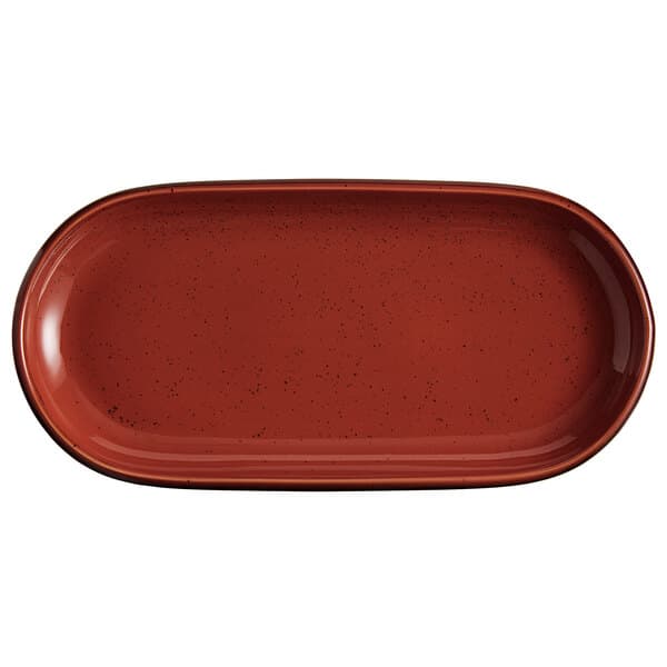 An Acopa Sedona Orange stoneware oblong coupe platter with black specks on a table.