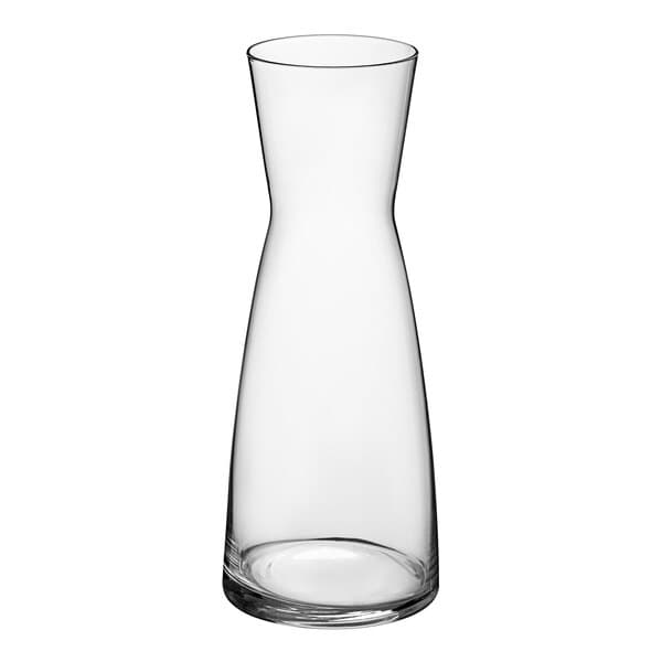 An Acopa clear glass carafe with a white background.