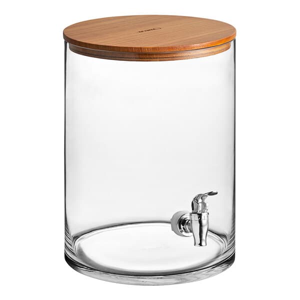 An Acopa glass beverage dispenser with a wood lid and faucet.