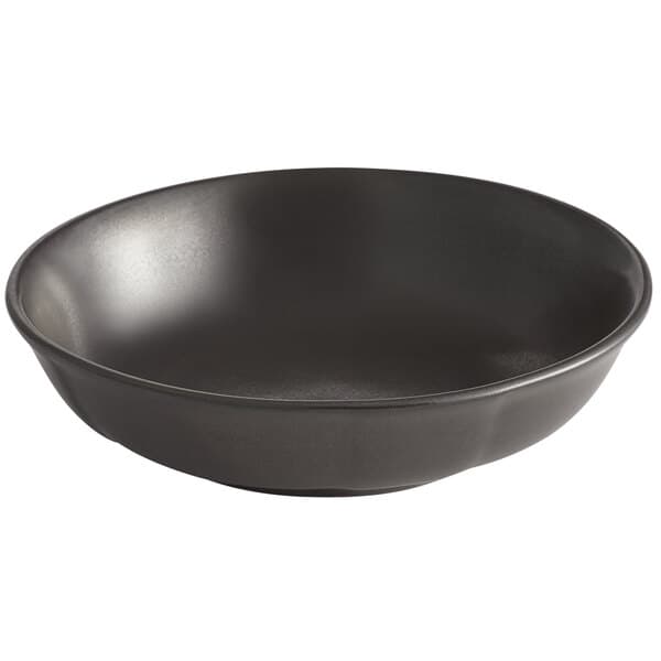 An Acopa Condesa scalloped porcelain fruit dish in matte armor gray.
