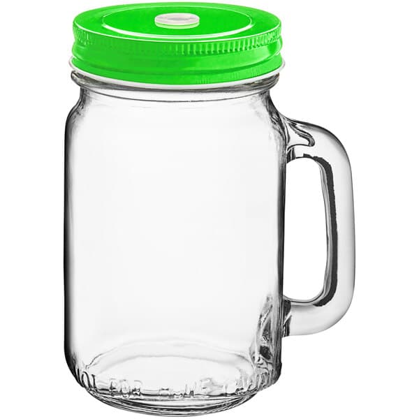 An Acopa glass drinking jar with a green metal lid.