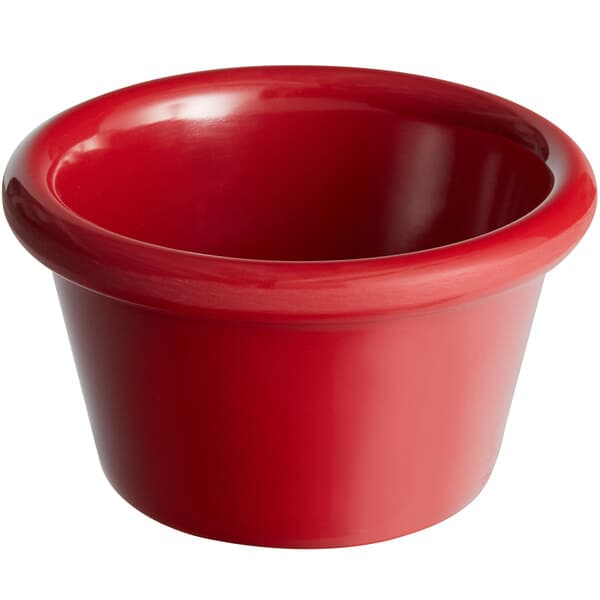 a red bowl with a white background