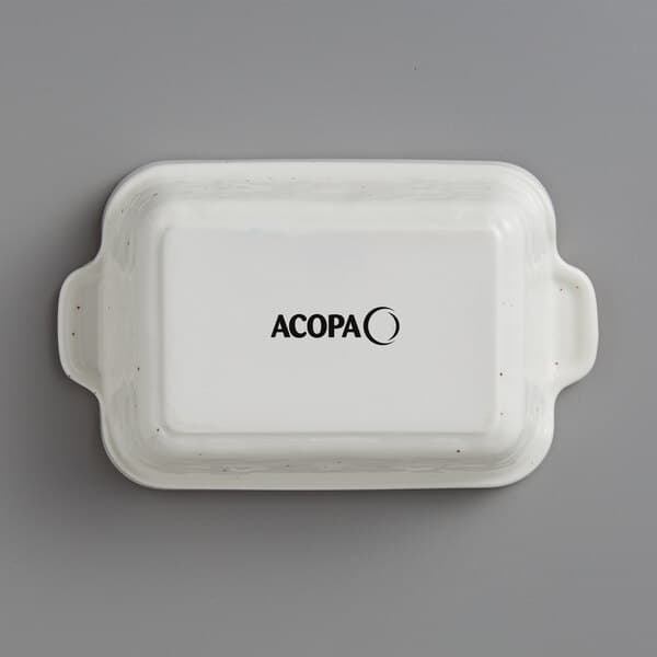 A white rectangular Acopa stoneware casserole dish with black text.