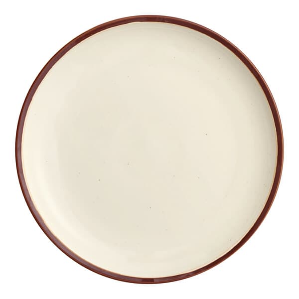 A round stoneware coupe plate with a vanilla bean-colored surface and a brown rim.