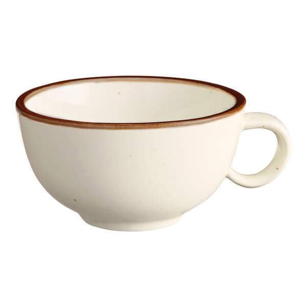A cream-colored stoneware cup with a brown rim and a handle.