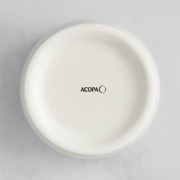 An ivory stoneware ramekin with the word Acopa in black text on the side.
