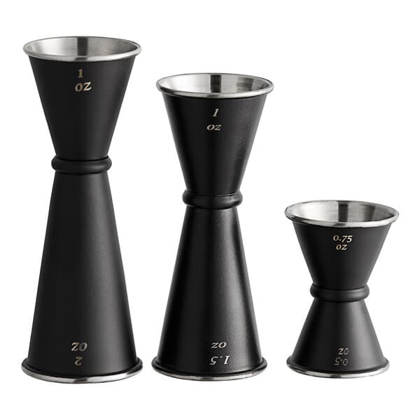 A black Acopa Japanese jigger with numbers on it.