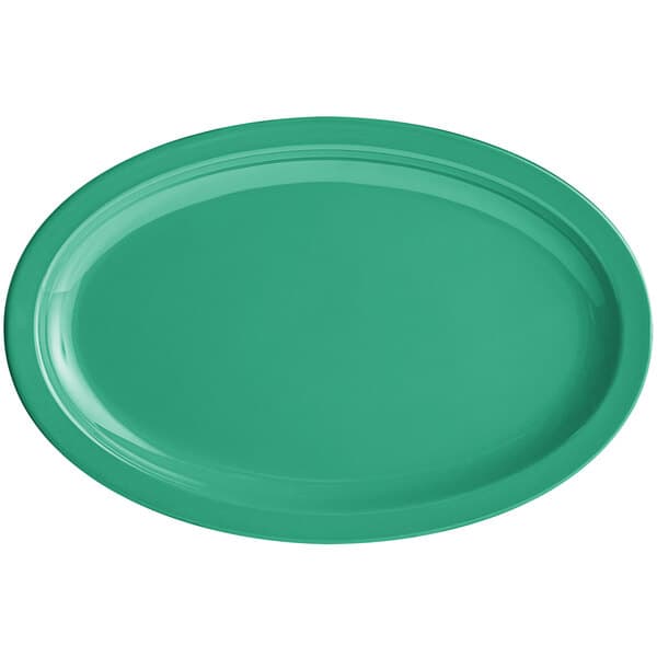 A green oval platter with a white background.