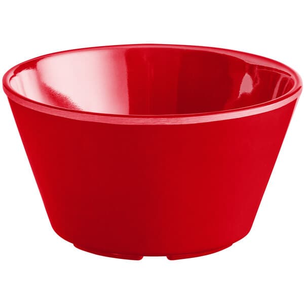 a red bowl with a white background
