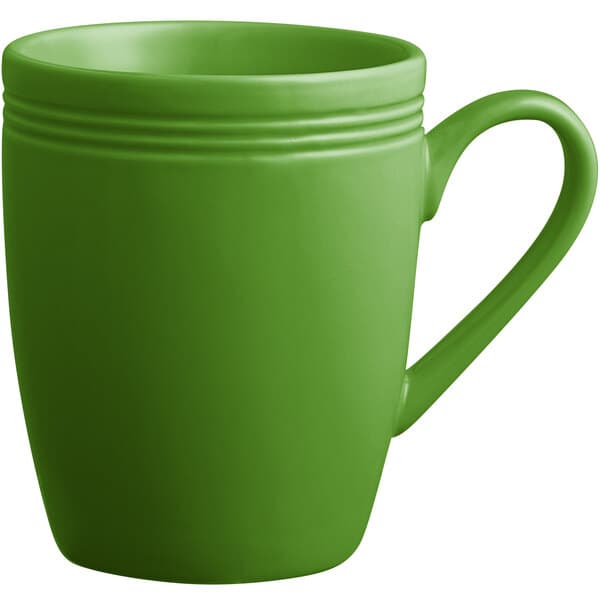 An Acopa Capri palm green stoneware mug with a handle.