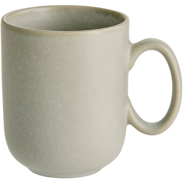 An Acopa Pangea white matte porcelain mug with a handle.