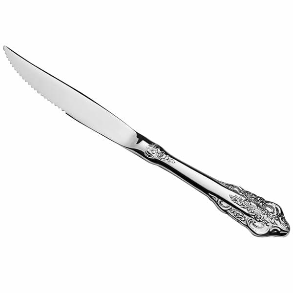 An Acopa stainless steel steak knife with a handle.