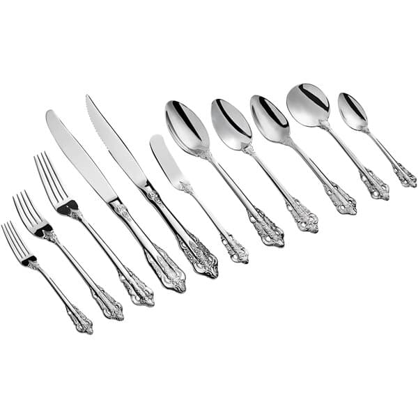 A close-up of an Acopa Ophelia stainless steel salad / dessert fork.