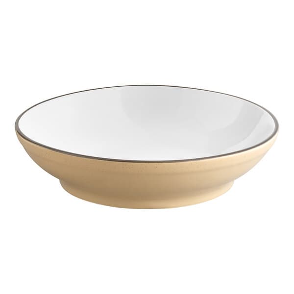 An Acopa Harvest Tan stoneware bowl with a black rim.