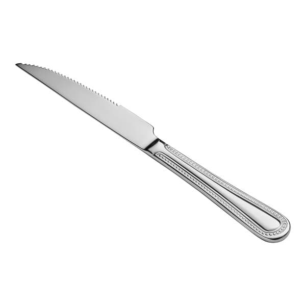 An Acopa stainless steel steak knife with a silver handle.