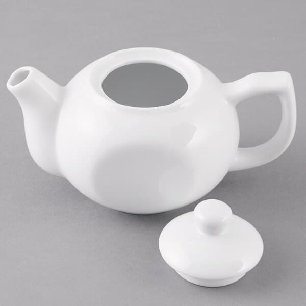 An Acopa bright white porcelain teapot with a lid.