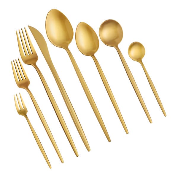 A close-up of a gold Acopa Odin bouillon spoon.