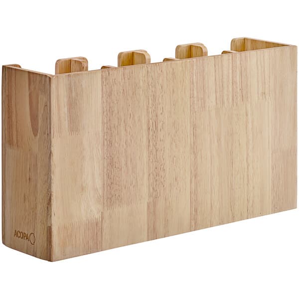 A wooden box with four sections and holes.