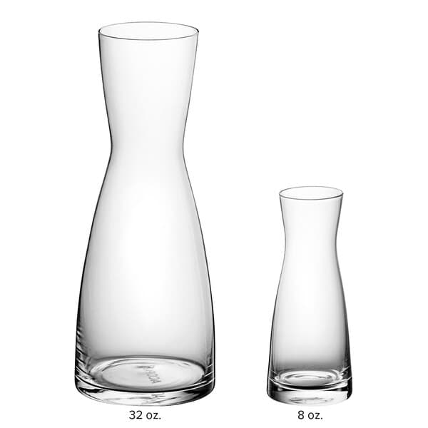 Two Acopa hourglass glass vases with different sizes and measurements.