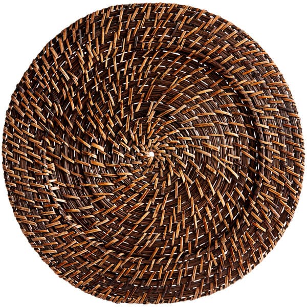 A round wicker Acopa charger plate with a spiral pattern.