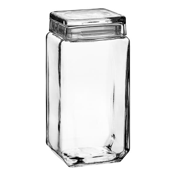 An Acopa clear glass jar with a lid.