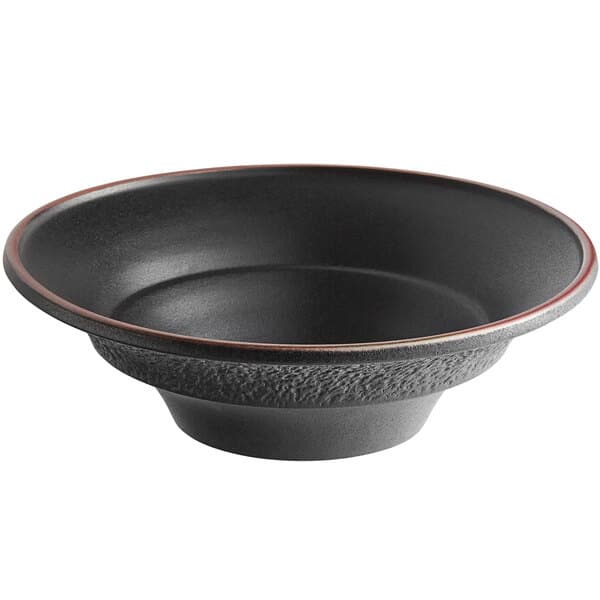 An Acopa Heika black matte stoneware pasta bowl with a brown rim.