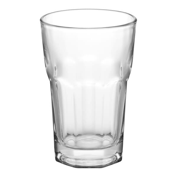 A clear, faceted 9.5 oz. highball glass.