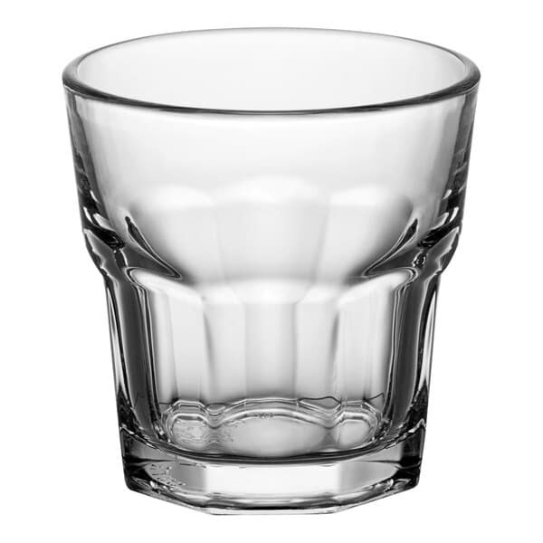 An Acopa Memphis clear glass with a scalloped edge.