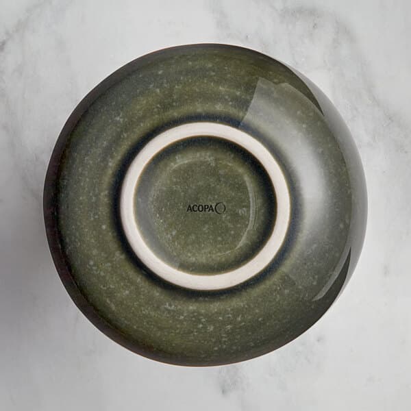 An Acopa Highlands juniper green sauce cup with a white rim.