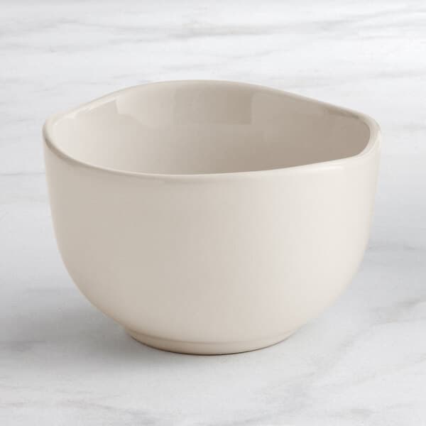 An Acopa Highlands white china bouillon cup on a marble surface.